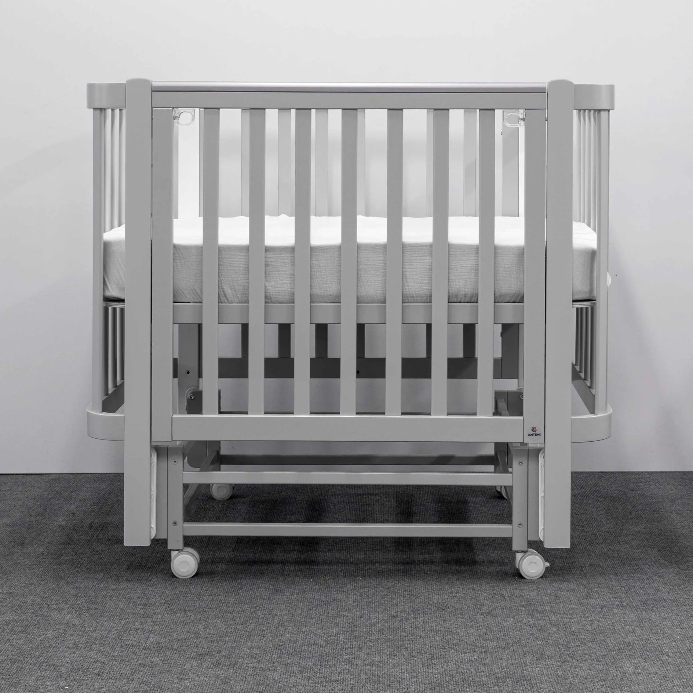 Кроватка детская ANTEMI Terra Light New с маятником 100х70