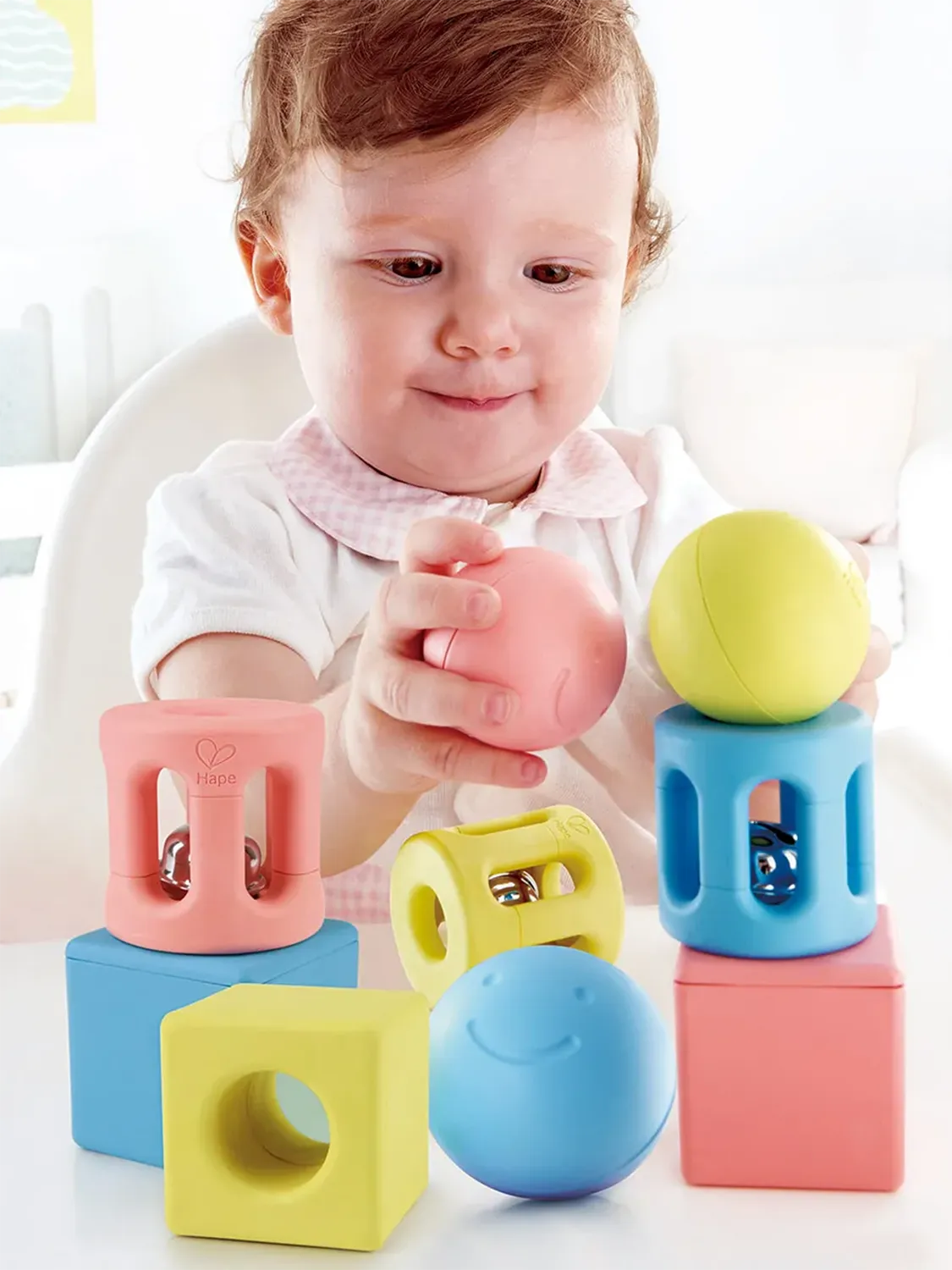 Набор погремушек HAPE для малышей Конструктор "Улыбка" E0456_HP