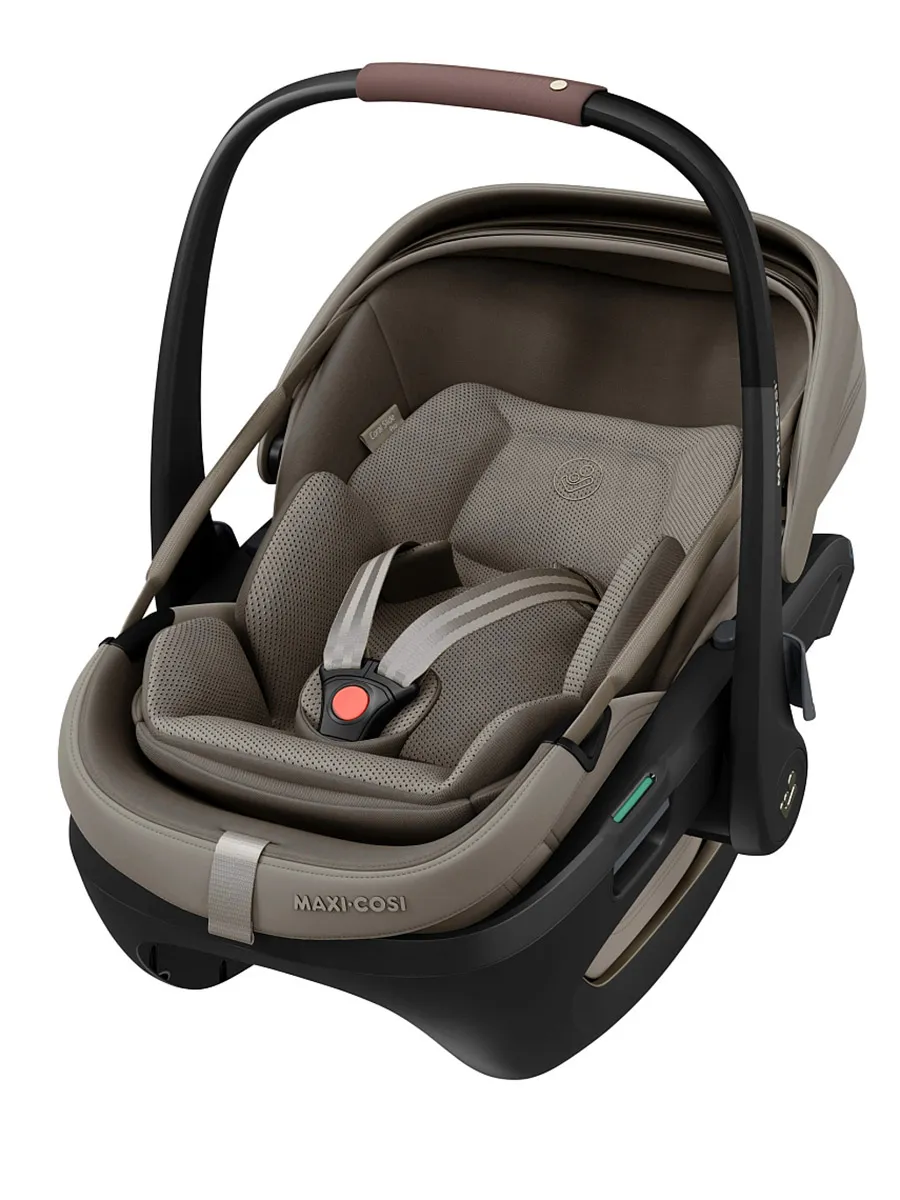 Автокресло 0+ Maxi-Cosi Coral Slide Pro, бежевый (oak truffle). Изображение 1