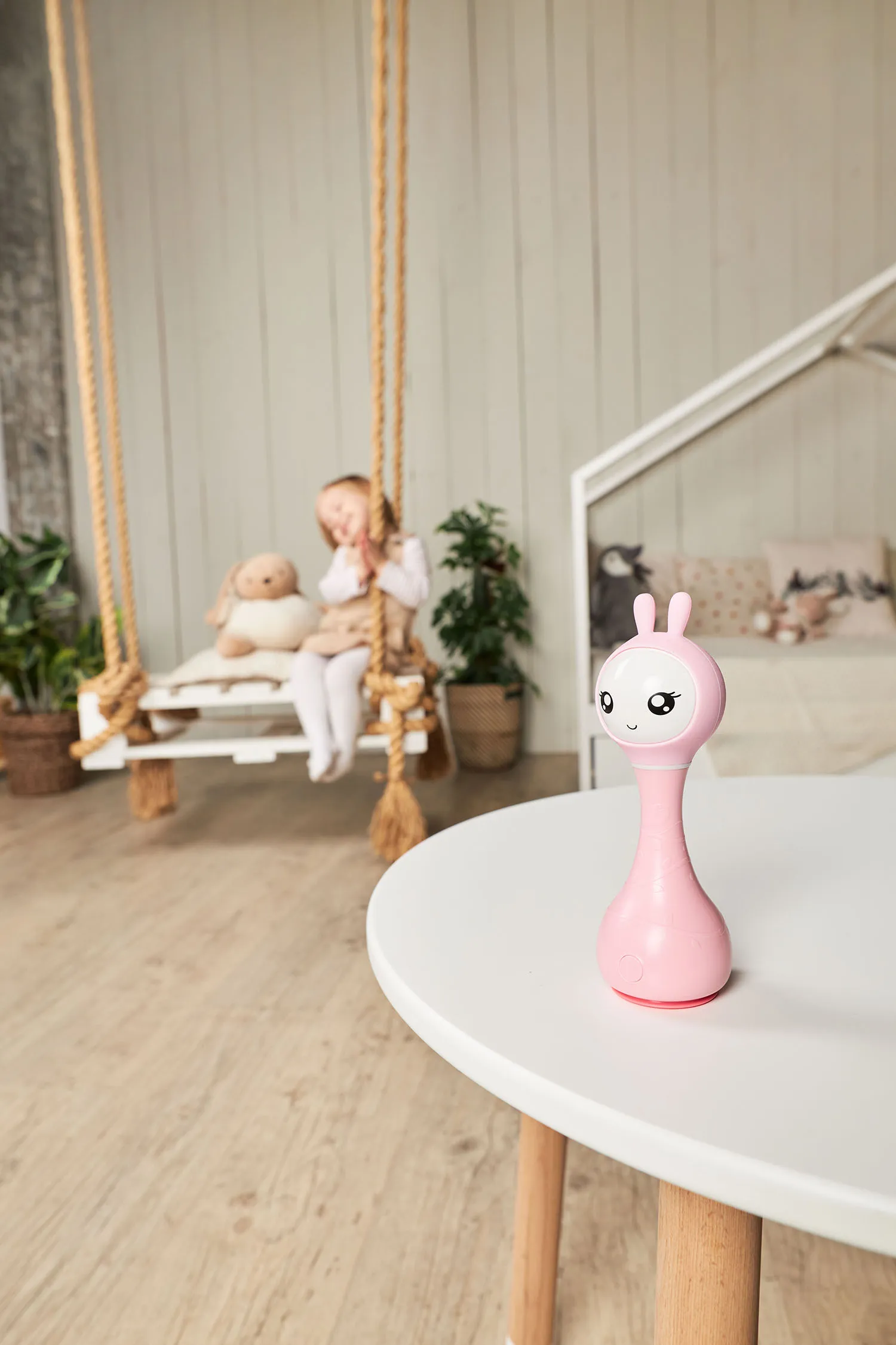 Музыкальная игрушка Alilo Умный зайка R1 розовый 60403