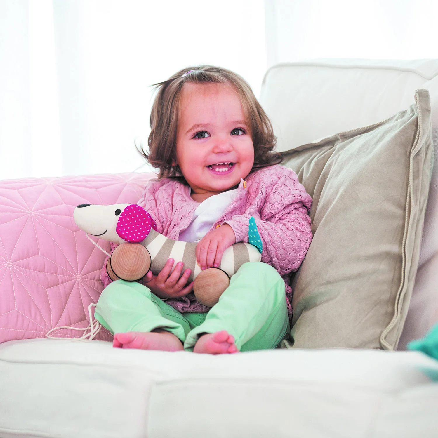 Игрушка-каталка для малышей «Собачка» Hape