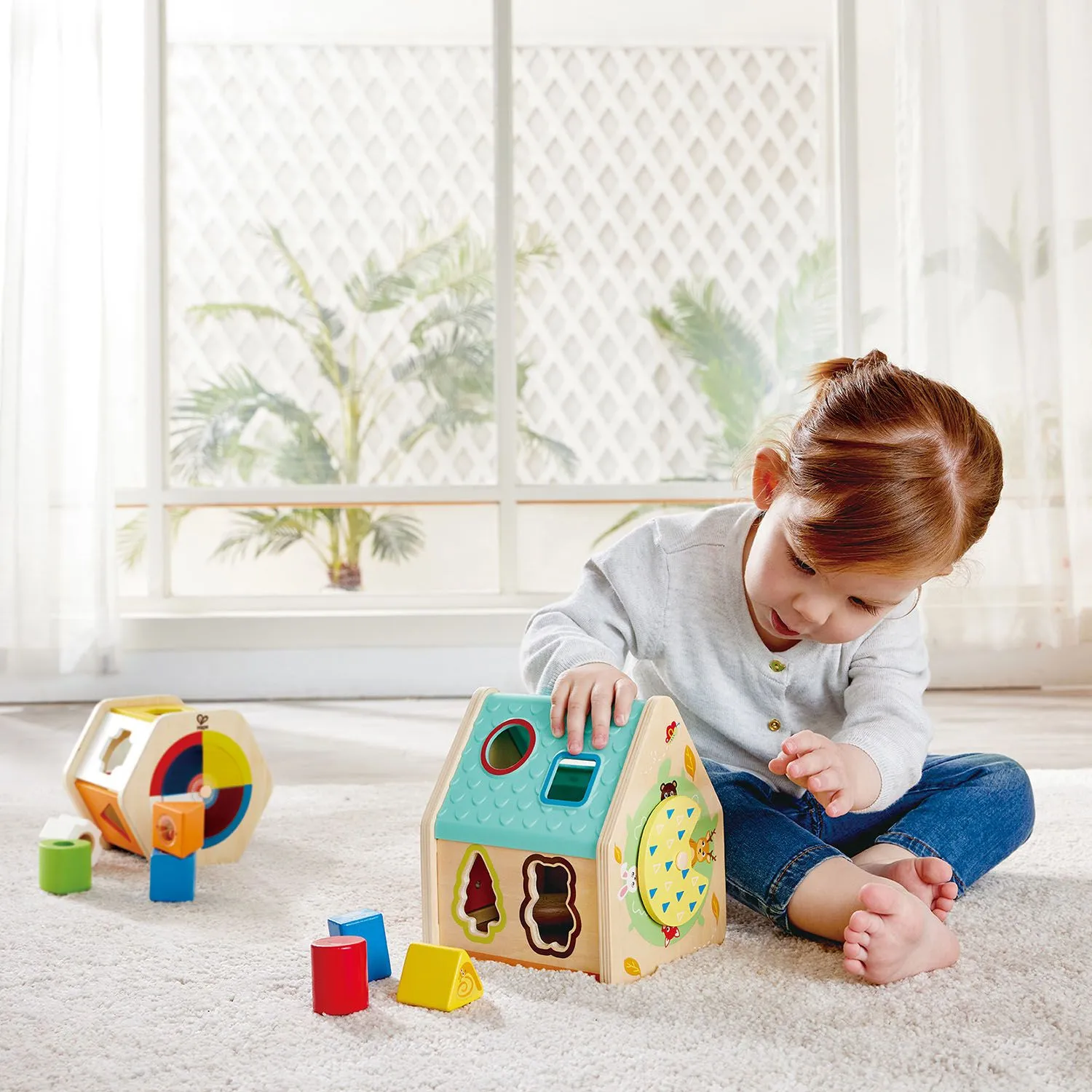 Игрушка HAPE развивающий Cортер «Домик на дереве» E0515_HP