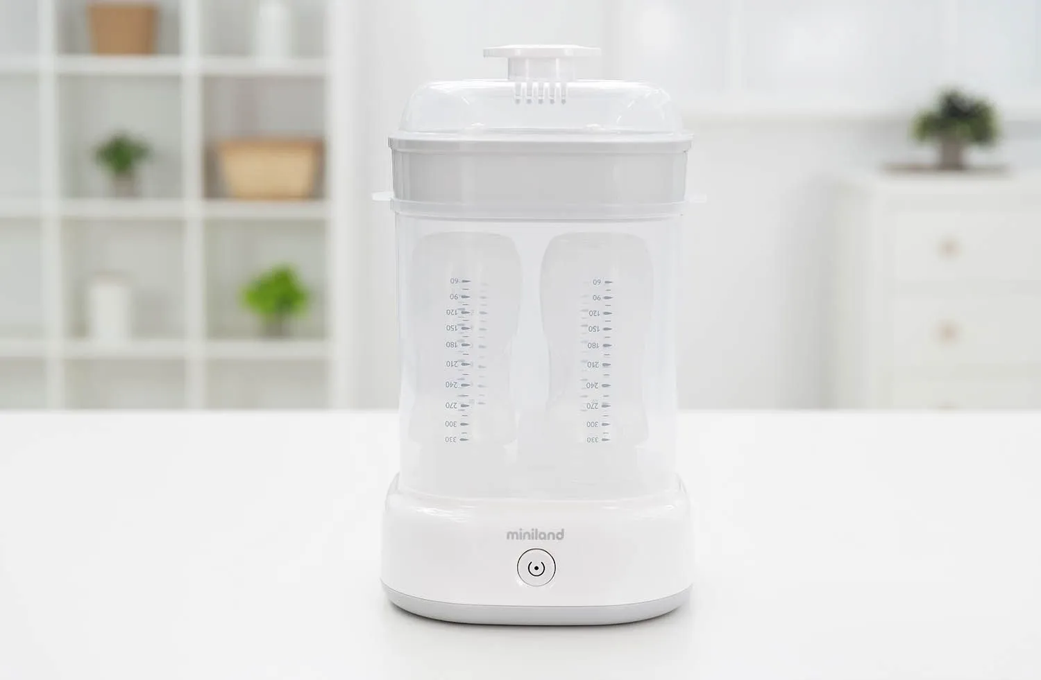 Стерилизатор компактный Miniland для бутылочек Mini Steamy белый 89580