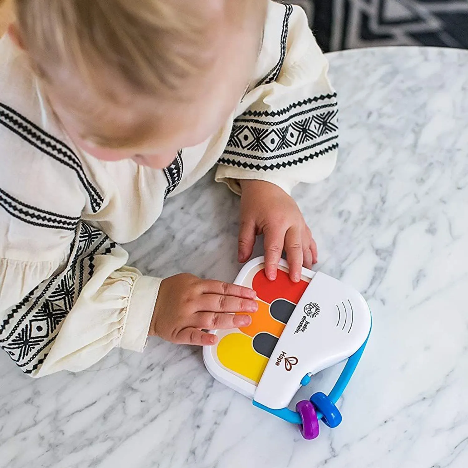 Музыкальная игрушка мини-пианино Hape «Волшебное прикосновение»