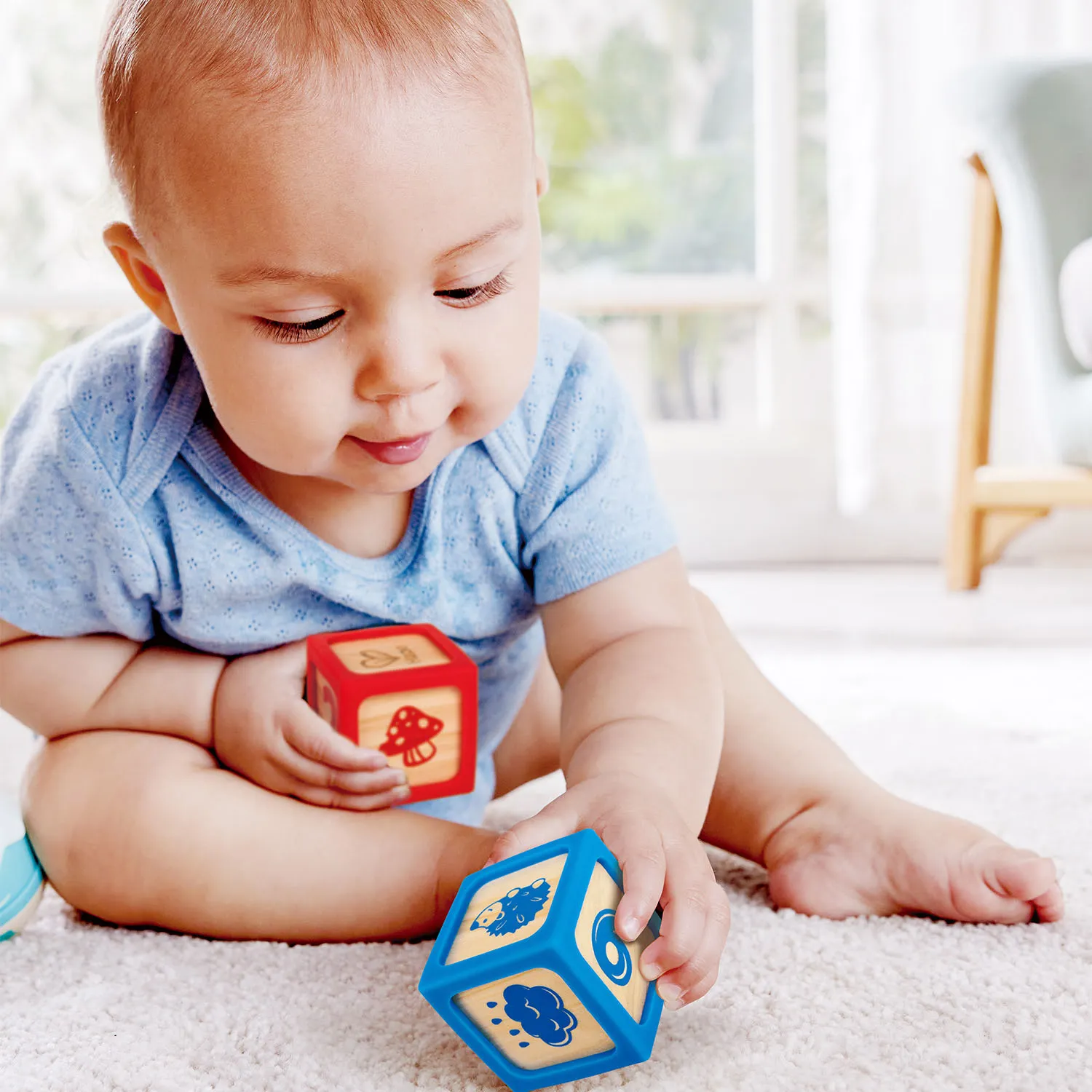 Кубики деревянные HAPE в силиконовых чехлах 4 шт E0132_HP