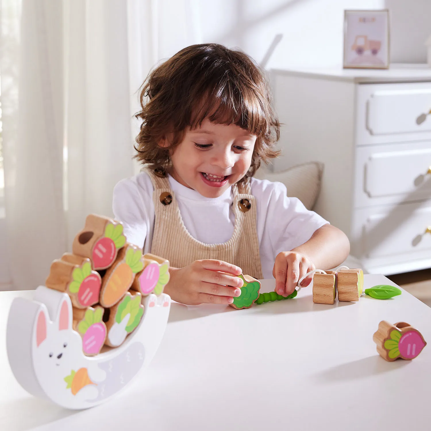 Игрушка HAPE шнуровка, балансир «Малышам» Собираем урожай с Зайкой  E0526_HP