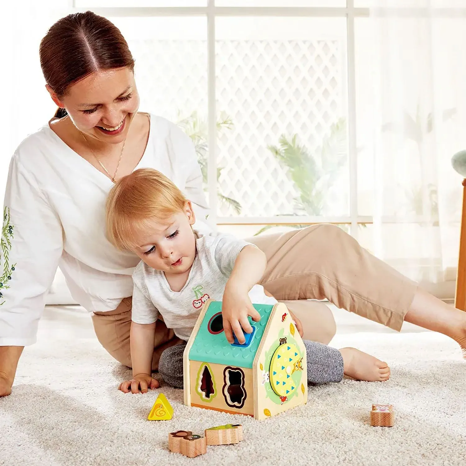 Игрушка HAPE развивающий Cортер «Домик на дереве» E0515_HP