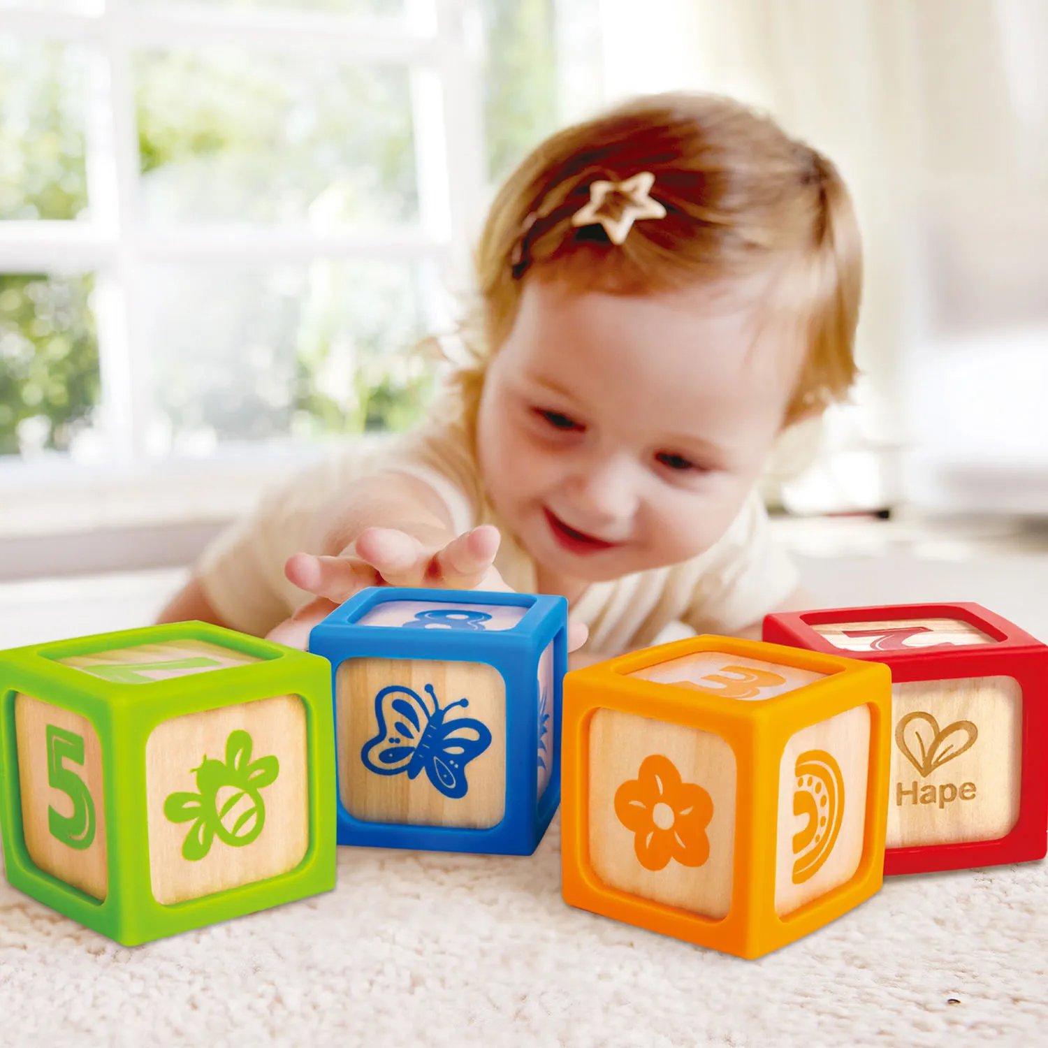 Кубики деревянные HAPE в силиконовых чехлах 4 шт E0132_HP