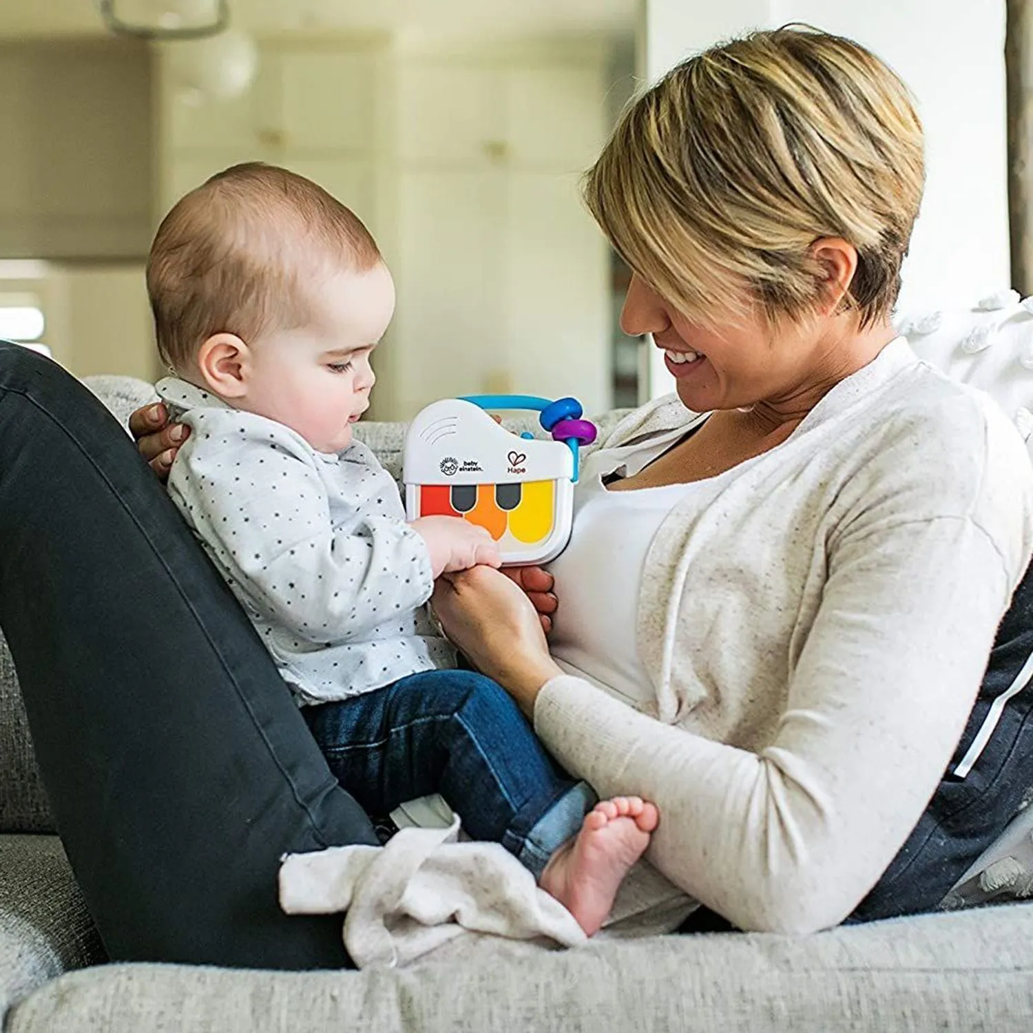 Музыкальная игрушка мини-пианино Hape «Волшебное прикосновение»