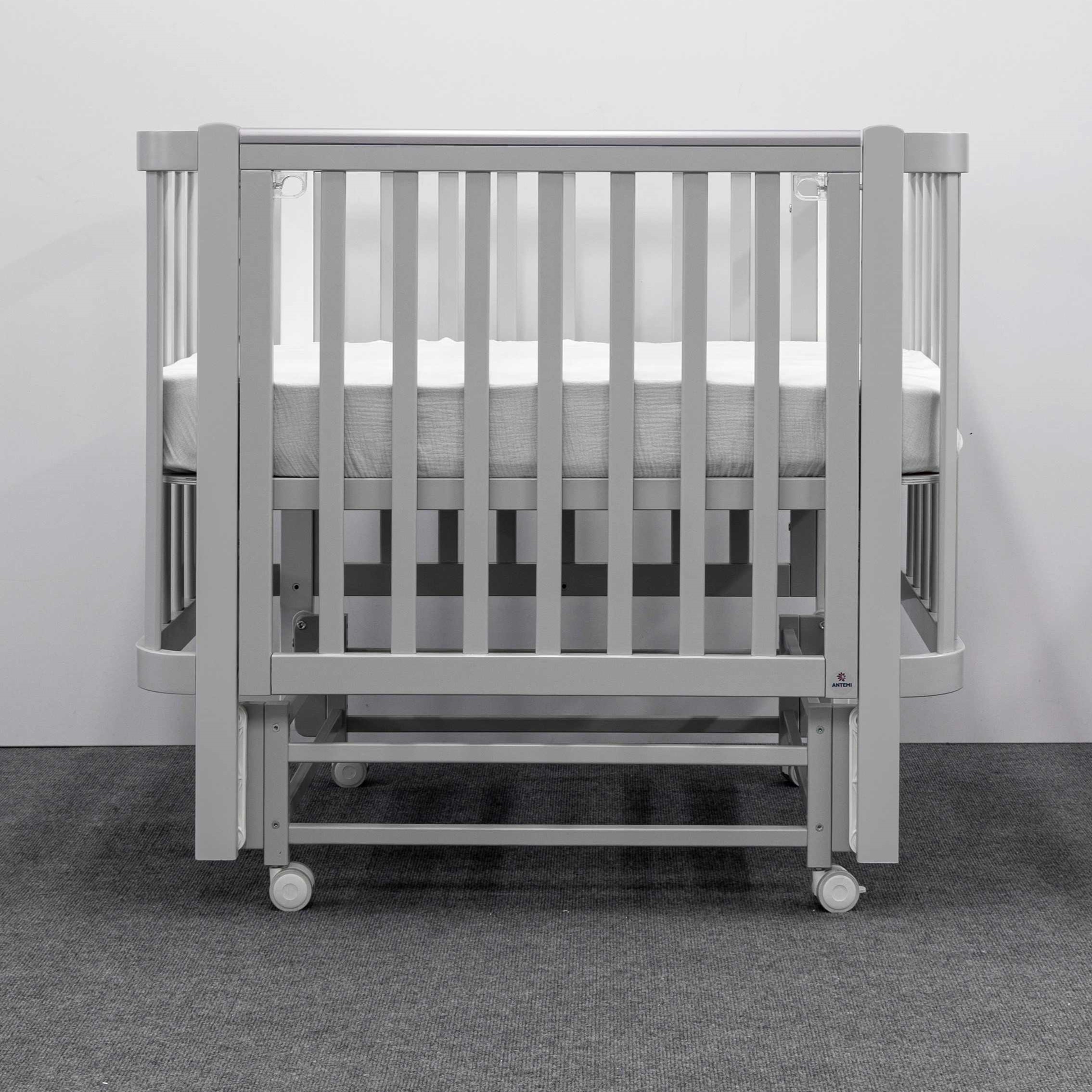 Кроватка детская ANTEMI Terra Light New с маятником 100х70