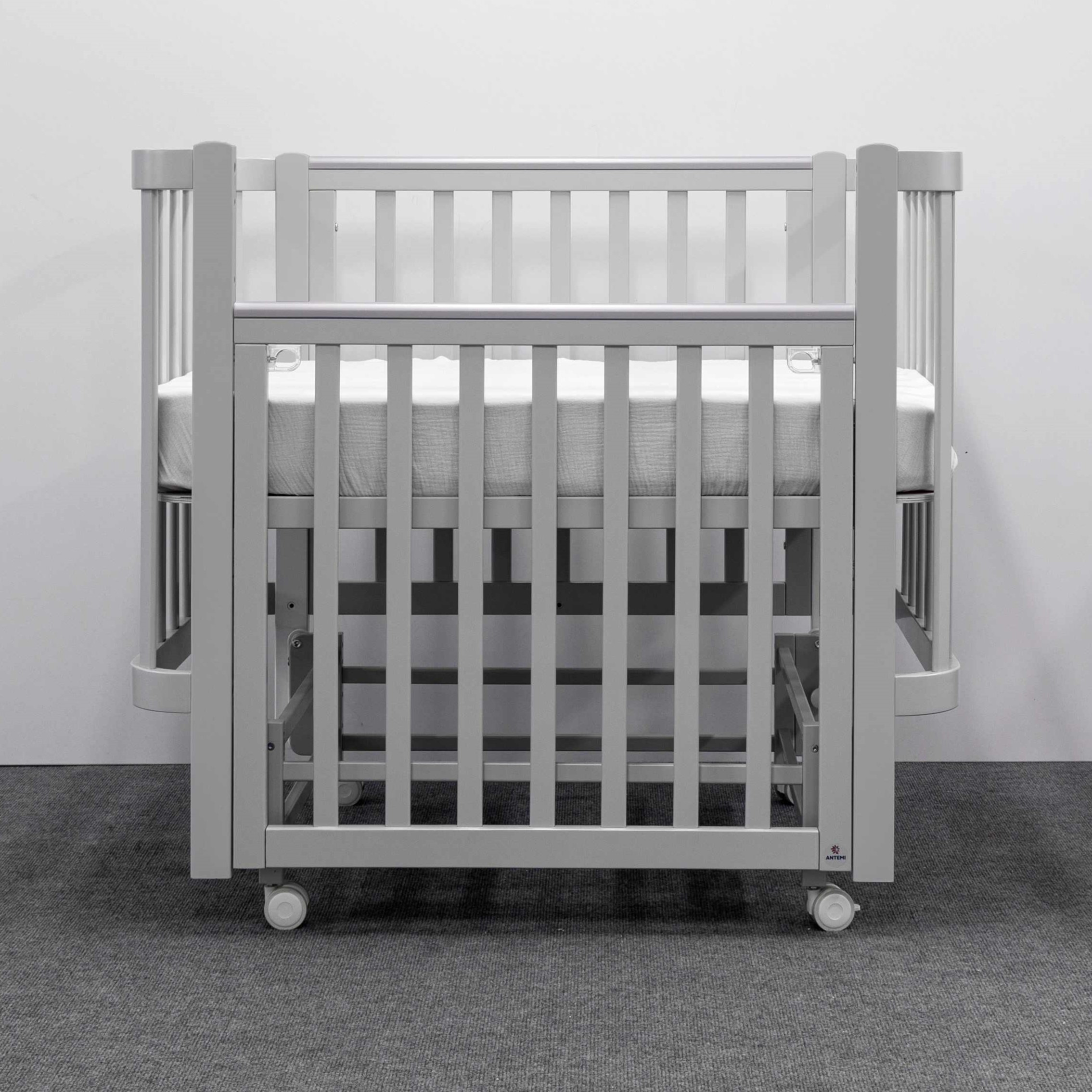 Кроватка детская ANTEMI Terra Light New с маятником 100х70