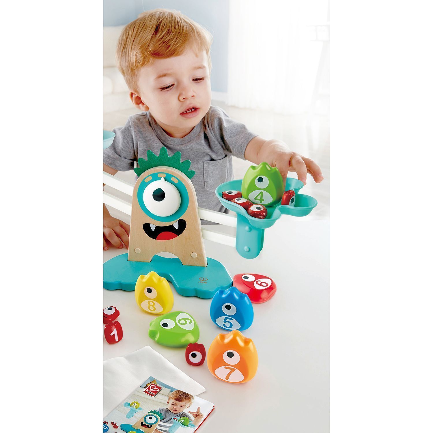 Игрушечные весы Hape «Монстрики»
