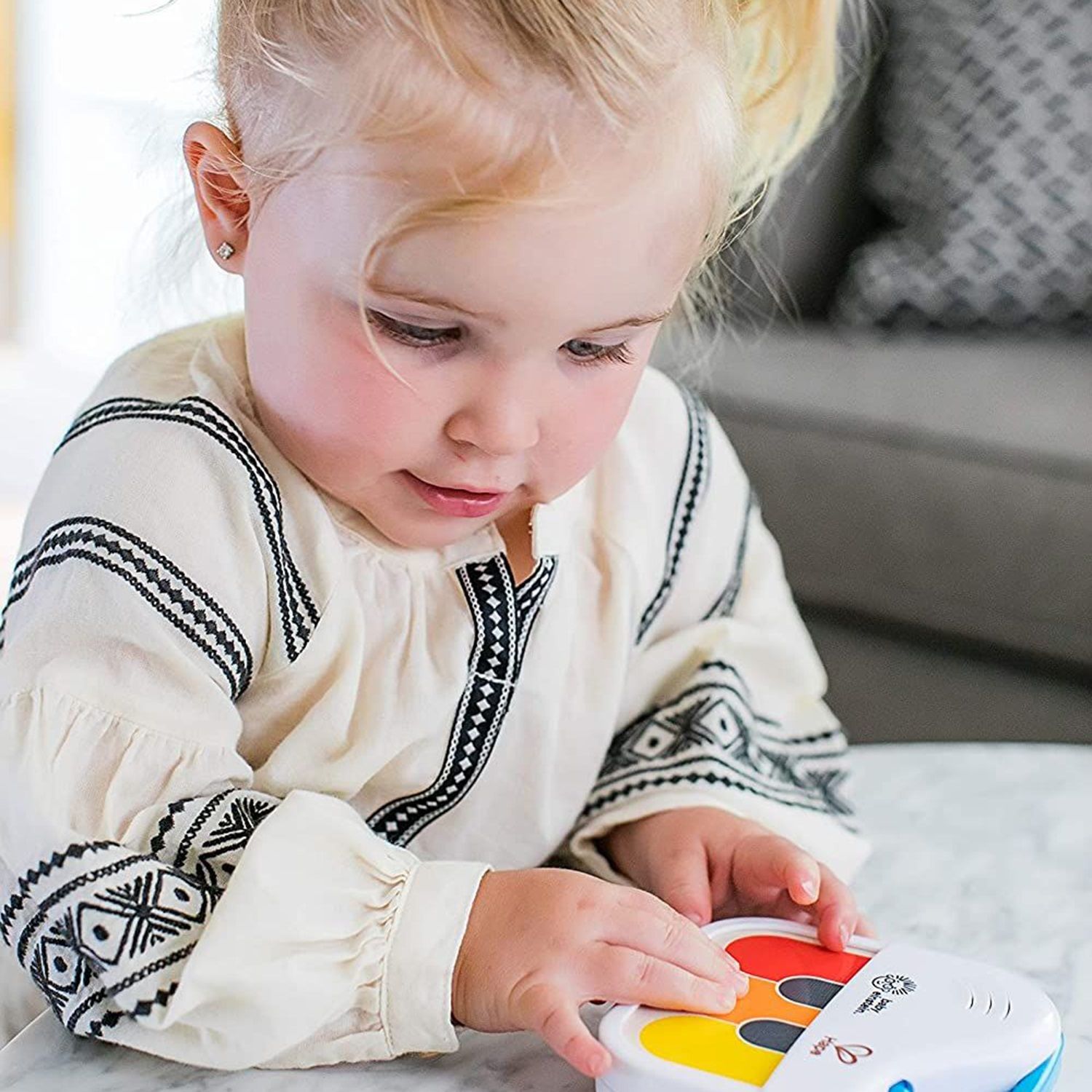 Музыкальная игрушка мини-пианино Hape «Волшебное прикосновение»